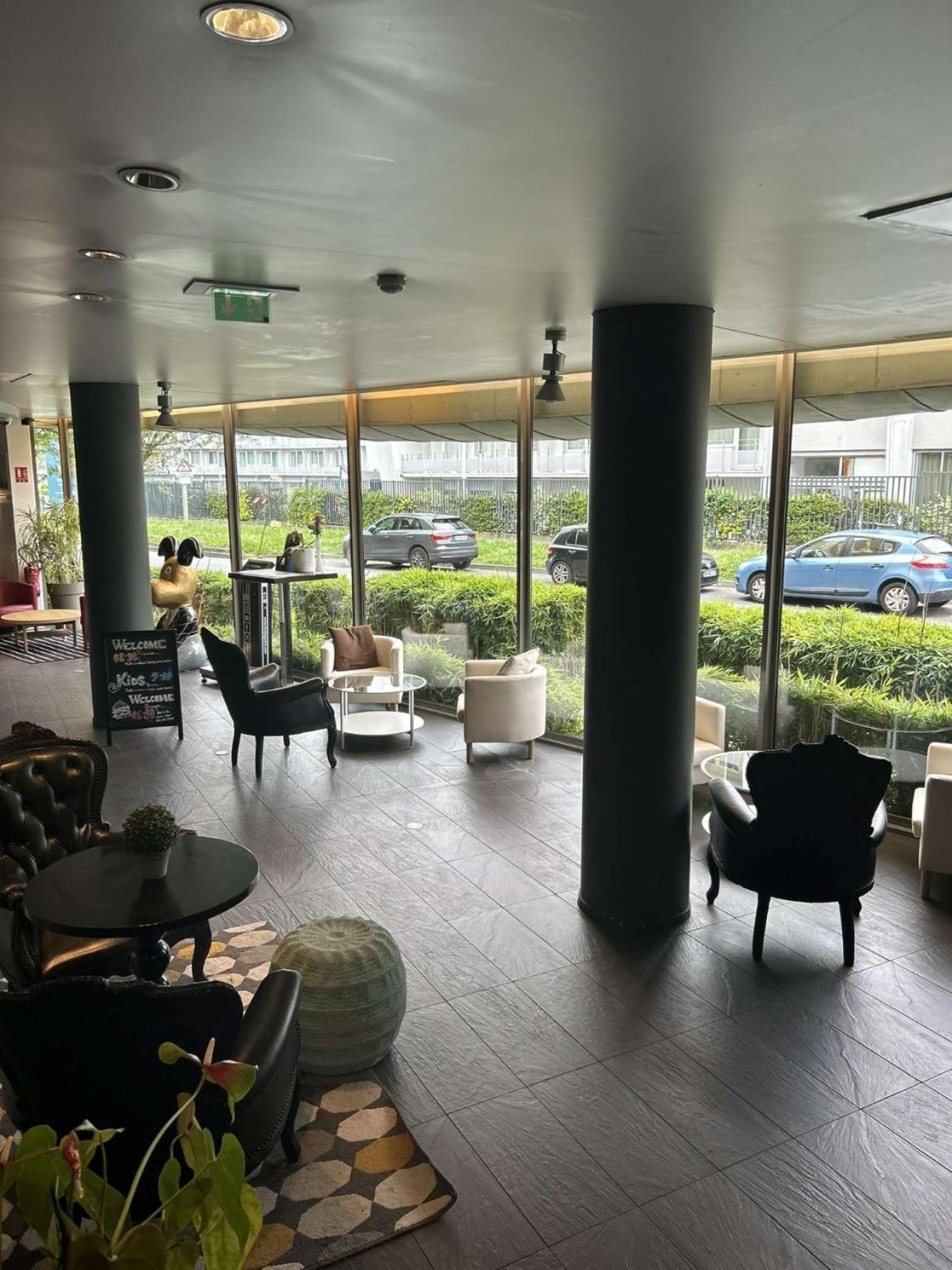 Standing Hotel Suites By Actisource Roissy-en-France Exterior foto